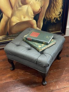 Vintage Dove Grey Deep Buttoned Leather Footstool With Queen Anne Legs. Circa - Vintage Composition- Leather Upholstery Hardwood Frame Quality Vintage Square Chesterfield Footstool With Deep Buttoned Top In Sumptuous Dove Grey Leather With Tucked Corners And Piped Edge Finish. Standing Upon Mahogany Queen Anne Legs. Condition- Pristine Leather. Minor Scratches To Legs Due To Age And Usage. Dimensions In Inches Height 13” Width 21” Depth 21”