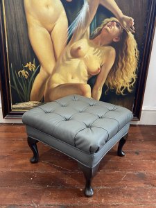 Vintage Dove Grey Deep Buttoned Leather Footstool With Queen Anne Legs. Circa - Vintage Composition- Leather Upholstery Hardwood Frame Quality Vintage Square Chesterfield Footstool With Deep Buttoned Top In Sumptuous Dove Grey Leather With Tucked Corners And Piped Edge Finish. Standing Upon Mahogany Queen Anne Legs. Condition- Pristine Leather. Minor Scratches To Legs Due To Age And Usage. Dimensions In Inches Height 13” Width 21” Depth 21”