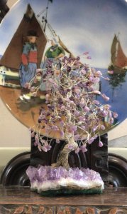 19th Century Amethyst & Silver Tree Of Life Set Upon Amethyst Stalactite Base. Circa - 1880 Composition - Solid Silver Branches Decorated With Amethyst Gemstones. Listing Description Beautiful Antique Sculptural Showpiece & Work Of Art Depicting A Elaborate Cabinet Of Curiosities ‘Tree Of Life’. An Abundance Of Twisted Vines Of Solid Silver Wire Create The Sturdy Trunk And Branches That Reach Out Bearing Over 120 Carats Of Genuine Individual Amethyst Gemstones. Original Antique Hand Crafted By Parisian Jeweller During The Late 19th Century And Set Upon Large Breathtaking Rare Amethyst Stalactite. The Stalactite Exhibits A Incredible Formation Of Large Crystals In A Variety Of Rich Purple Hues. Very Rare Museum Grade Collectors Item. Provenance Purchased From Parisian Collector During Early 20th Century. Part Of Lord Hill Museum’s Private Collection. Condition- Original Antique As Expected There Are A Few Amethyst Stones Missing From Branches Due To The Age/Use And Delicate Nature Of This Showpiece. If You Require More Information Or Images Please Contact Us On 07376618513 Thank-you Dimensions In Inches Height 9” Width 5”