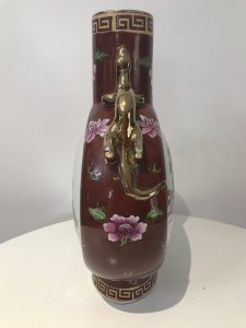 Vintage Cantonese Oriental Vase Komodo Dragon Guilt Handles With Family Portraits Of Men With Children On One Side And Ladies Playing Lutes On The Other Hand Painted On Porcelain With Lotus Flowers And Greek Key Style Embellishments Stamped On Base Beautiful Artists Work Stunning Shaped Vase Dimensions In Inches Height 15.5” Width 11” Depth 4”