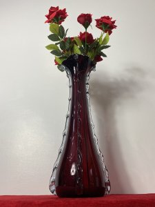 Large Italian Red Ruby Glass Vase With Decorative Scalloped Ornamentation Circa - Vintage Composition - Red Ruby Glass Large Hand Blown Tulip Shaped Sculptured Glass Vase In A Rich Ruby Red Colouration. Scalloped Mouth Opening With Slim Body And Bulbous Base, Decorated In Segmented Pattern With Vertical Rolling Waves Of Translucent Glass. In The Murano Style But Unsigned. Beautifully Decorative Art Vase For Display Centrepiece Or Flower Arrangement. Dimensions In Inches Height 19.5" Width 5.5" At Base