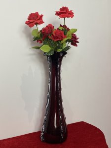 Large Italian Red Ruby Glass Vase With Decorative Scalloped Ornamentation Circa - Vintage Composition - Red Ruby Glass Large Hand Blown Tulip Shaped Sculptured Glass Vase In A Rich Ruby Red Colouration. Scalloped Mouth Opening With Slim Body And Bulbous Base, Decorated In Segmented Pattern With Vertical Rolling Waves Of Translucent Glass. In The Murano Style But Unsigned. Beautifully Decorative Art Vase For Display Centrepiece Or Flower Arrangement. Dimensions In Inches Height 19.5" Width 5.5" At Base