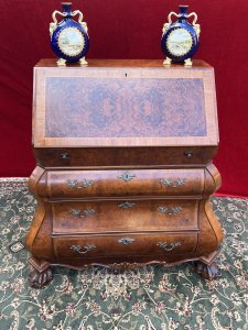 Fine Quality Dutch Burl Walnut With Satinwood Inlay Bombe Writing Desk Circa - Vintage Composition - Burl Walnut with Satinwood Inlay Listing Description Finest Quality Dutch Bombe Bodied Writing Bureau In Rich Burl Walnut With Intricate Satinwood Cross Bands And Herringbone Inlays. Pull Down Front Lid With Pull Out Supports, Reveals Interior Central Locking Cupboard With Surrounding Brass Handled Stepped Drawers, Pigeon Hole Compartments And Two Faux Book Hidden Compartments With Baize Inset Writing Slope. Cabinet Body With Three Ornate Bombe Shaped Deep Drawers All With Brass Acanthus Leaf Handles And Central Ornate Brass Filigree Motif Lock. Set Upon Large Claw Feet. Fine Vintage Reproduction Writing Cabinet In Period Antique Dutch Style. Stunning Patina And Rich Walnut Wood Grain Patternation. Heavy Item Condition - Excellent Minor Scratches Visible, Some Chips Visible Due To Age. Please See Images Dimensions In inches Height 41" X Width 42" X Depth 21" x Kneehole Height 21" For Further Information Please Call 07376618513 During Business Hours.