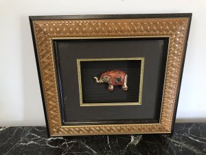 Indian Minature Carved Elephant In A Carved Guilt Picture Frame Carved Wooden Guilded Elephant Set With Faux Precious Stones Set In A Simulated Bamboo Frame With Guilt Hold Edging Dimensions In Inches Height 11.5” Width 13”