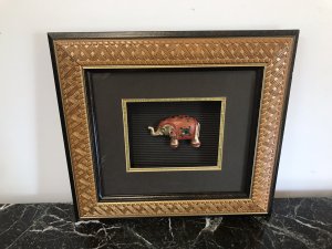 Indian Minature Carved Elephant In A Carved Guilt Picture Frame Carved Wooden Guilded Elephant Set With Faux Precious Stones Set In A Simulated Bamboo Frame With Guilt Hold Edging Dimensions In Inches Height 11.5” Width 13”