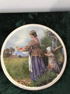 Collection Of 3 Decorative Porcelain Wall Plates Plate 1 By Eugene de Blaas Entitled The Balcony Ladies Gazing Over A Stone Balcony Plate 2 By Myles Burkett Foster Entitled Returning Home Mother And Child Gathering Rhubarb In A Field Plate 3 By Eugene de Blaas Entitled The Proposal Conversation In The Market Square Lovely Colours And Detail Dimensions Diameter 10.5”