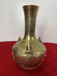 Ornate Chinese Brass Temple Vase With Frogs And Lotus Leaf Engraved Decoration. Circa ~ 1880 Thin Stem Neck Adorned With Cloud And Maze Decorative Engravings With Bulbous Base Decorated With Frogs, Lilly Pads And Lotus Leaves. Very Unusual Piece With Harlequin Decoration On The Base. A Heavy Piece Which Has Been Very Finely Engraved. Unsigned Dimensions In Inches Height 10” Width 6.5”