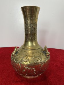 Ornate Chinese Brass Temple Vase With Frogs And Lotus Leaf Engraved Decoration. Circa ~ 1880 Thin Stem Neck Adorned With Cloud And Maze Decorative Engravings With Bulbous Base Decorated With Frogs, Lilly Pads And Lotus Leaves. Very Unusual Piece With Harlequin Decoration On The Base. A Heavy Piece Which Has Been Very Finely Engraved. Unsigned Dimensions In Inches Height 10” Width 6.5”