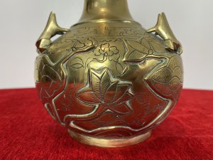 Ornate Chinese Brass Temple Vase With Frogs And Lotus Leaf Engraved Decoration. Circa ~ 1880 Thin Stem Neck Adorned With Cloud And Maze Decorative Engravings With Bulbous Base Decorated With Frogs, Lilly Pads And Lotus Leaves. Very Unusual Piece With Harlequin Decoration On The Base. A Heavy Piece Which Has Been Very Finely Engraved. Unsigned Dimensions In Inches Height 10” Width 6.5”