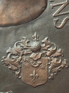 Circa - 19th Century Composition - Beaten Copper Large Copper Wall Plaque Depicting Flemish Baroque Painter Sir Peter Paul Ruben’s Classical Relief Portrait Showing Artist Peter Paul Ruben’s At The Tome The Plaque Was Created Wearing A Large Tassel Hat And Oversized Lace Collar. The Artist Gazes To The Right. A Decorative Coat Of Arms Placed Near The Face And Artist Ruben’s Name In Latin Scripture Inscribed Around The Top Edge. Stunning Craftsmanship A Wonderful Historic Showpiece. Dimensions In Inches Height 25.5” X Depth From Wall 2”