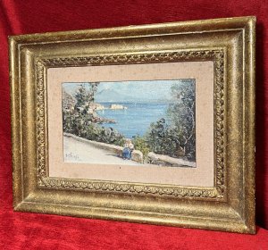 British Fine Art Oil Painting Of Portuguese Coastal View Attributed To Edward Seago Circa - 1950 Composition - Oil On Canvas Brief Artist History Edward Brian Seago March 31st 1910 - January 19th 1974 English Watercolour And Oil Artist Known For Beachscapes And Streetscenes. Edward Seago Briefly Studied With The Painter Sir Alfred Munnings, But Was Mostly Self Taught. Seago Worked In The Late Impressionistic Style Reminiscent Of John Singer Sargent. Seago's Work Is Characterised By Its Very Carefully Observed Colour Modulation And Grounded Sense Of Realism. Edward Seago's Works Are Notably Collected By British Royalty Including Queen Elizabeth, The Queen Mother And Prince Phillip, With Many Of His Finest Artwork Displayed On The Walls Balmoral. Today Seago's Artworks Are Found in Collections Of The Fine Art Gallery San Fransisco, The Royal Collection In London As Well As The National Portrait Gallery London. Listing Description Finely Detailed Impressionist Artwork Attributed To Edward Brian Seago Of Portuguese Coastal View With Forefront Depicting Female Sitting Upon A Wall On Roadside, Fabulous Sea View Behind With Surrounding Native Foliage, Central Coastal Town Bay And Sea Line Flowing Into The Distance. Vibrant Colour Palette Showing Landscape In Vivid Sunshine With Clear Skies And Rich Blue Seas. Quality Artwork Signed E SEAGO Set With Canvas Boarder In Original Gilt Frame. Condition - Excellent Showing Signs Of Damp To Canvas Boarder. Paintwork In Good Order. Dimensions In Inches Frame Height 14.5" X Width 18.5" Painting Height 6.5" X Width 10.5"