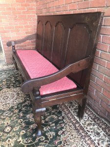 Period Antique 1760 George III Four Panel ‘Great Hall’ Oak Settle. Solid Oak Bench With Gothic Panelled Back, Sweeping Elegant Arm Rests With Red Fleur De Lys Style Motif Upholstered Cushion And Ship Work Roping Supports. Cabriole Shape Leg Supports Hand Carved During The Reign Of George III 1760 Provenance Part Of Lord Hill Museum Collection Please Note This Is A Genuine Antique Dated 1760 Due To Age There Are Signs Of Wear The Back Left Leg Has Previously Been Mended A Metal Brace Fitted For Support Dimensions In Inches Height Width Depth