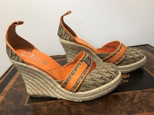 Genuine Dior Orange Leather And Diorissimo Canvas Espadrille Wedges Size 38.5 EU 5.5 UK Stunning Orange Leather Details Round Toe Metal Dior Logo Band On The Front These Dior Wedges Are In Immaculate Condition Only Worn Once The Outer Shoe Show No Signs Of Wear Only Wear Marks Are On The Soles From Single Use Leather And Diorissimo Fabric Outer Shell Leather Lining And Leather Soles Heel Height - 4.5”