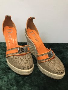 Genuine Dior Orange Leather And Diorissimo Canvas Espadrille Wedges Size 38.5 EU 5.5 UK Stunning Orange Leather Details Round Toe Metal Dior Logo Band On The Front These Dior Wedges Are In Immaculate Condition Only Worn Once The Outer Shoe Show No Signs Of Wear Only Wear Marks Are On The Soles From Single Use Leather And Diorissimo Fabric Outer Shell Leather Lining And Leather Soles Heel Height - 4.5”
