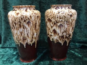 Fine Pair Art Deco Melba Ware Drip Glaze Fine Arts Vases Unique Design Cylindrical Shaped Vase With Contest Drop Glaze In Dark Brown Nd White Drip Signed In The Bases Melba Ware Fine Arts Collectable And Perfect Condition Provenance Part Of Lord Hill Museum Fine Arts Collection Dimensions In Inches Height 10.5” Diameter 17.5” Top Rim Diameter 3.2” Depth