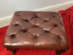 Vintage Deep Buttoned Red Leather Chesterfield Footstool Set Upon Mahogany Queen Anne Legs Circa - Vintage Composition - Wood Frame/ Leather Upholstery Listing Description Wonderful Vintage Original Red Deep Buttoned Leather Upholstered Footstool In Iconic Diamond Chesterfield Pattern. Rectangular Shape With Hardwood Frame With Decorative Polished Mahogany Queen Anne Legs. Condition - Very Good Used Showing Minor Scratches/ Signs Of Wear Due To Usage / A Slight Tear To Leather Please See Images. Dimensions In Inches Height From Floor 12" Width 24" Depth 19"
