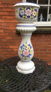 Italianate Porcelain Floral Hand Painted Jardiniere On Ornate Stand Circa - Vintage Composition- Ceramic Bulbous Bowl With Scalloped Relief Edging And Blue Accent Lines. The Front Elevation Is Hand Painted With Three Brightly Coloured Floral Motifs With Green/ Blue Foliage. The Bowl Sits Upon Elegantly Shaped Cylindrical Stand Decorated With Matching Floral Sprays And Octagonal Base. Stunning Planter For Floral Display In Garden Room/ Kitchen/ Lounge Condition- Vintage Used No Damage Lovely Condition Provenance Purchased From Grand Villa In Tuscany Italy. Dimensions In Cms Height 76cm Vase Height 21cm Base Height 55cm Vase Width 27cm