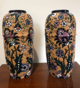 Stunning Pair Of Art Noveau Period Museum Grade Amphora Vases Czechoslovakian Boarder Made Amphora Vases Clearly Marked Stamp On The Bases Hand Crafted Earth Tone Peach Ridge Boarder Vase With Geometric Floral Pattern In High Shine Coloured Glazes Stunning Quality Collectors Item Immaculate Condition Provenance Lord Hill Museum Fine Art Collection Dimensions In Inches Height 14” Width 6.5” Vase Diameter 20.5” Top Rim Diameter 11”