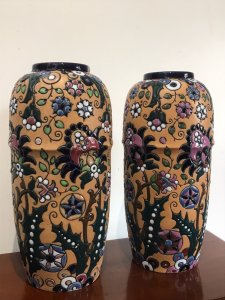 Stunning Pair Of Art Noveau Period Museum Grade Amphora Vases Czechoslovakian Boarder Made Amphora Vases Clearly Marked Stamp On The Bases Hand Crafted Earth Tone Peach Ridge Boarder Vase With Geometric Floral Pattern In High Shine Coloured Glazes Stunning Quality Collectors Item Immaculate Condition Provenance Lord Hill Museum Fine Art Collection Dimensions In Inches Height 14” Width 6.5” Vase Diameter 20.5” Top Rim Diameter 11”