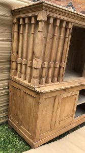 Mid 19th Century Pine Pillared Housekeepers Cupboard Stunning Turned Pillars All Around The Top Cupboard Centred Mirrored Door With Storage Hooks For Hanging Housekeeping Items Two Door Cupboard At The Bottom With Shelving And Storage Space Stunning Honey Pine A Lovely Golden Colour Stands On Turned Bun Feet Heavy Item Top Lifts Off Exceptional Antique Piece Dated 1875 Made In Cheshire By A Local Cabinet Maker Was Purchase From A Manor House Would Be Perfect On A Manor Or Farm House Stunning Conversation Piece Weight Approx 90kg Dimensions In Inches Height 72.5” Width 69” Depth 27”
