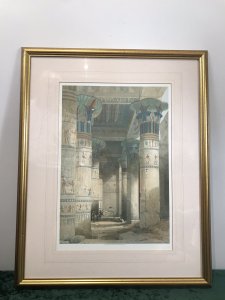 Fine Lithograph Title - View Under The Grand Portico Philae Egypt By Artist David Roberts 23/10/1796-25/11/1864 Lithograph Printed By L Hughes 1st Edition Taken From Original Painting By David Roberts R.A Known Orientalist Painter From Edinburgh Scotland Well Known For Prolific Lithographs Of Egypt During Tours Of The East 1838-1840 Artist JMW Turner Told Him To Stop Painting Theatre Scenery And Go To Egypt To Study Set In Guilt-wood Frame And Glazed With Inner Boarder Frames Truly Stunning Egyptology At It’s Very Best Stunning Condition Dimensions In Inches Height 30” Width 24”