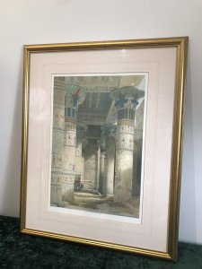 Fine Lithograph Title - View Under The Grand Portico Philae Egypt By Artist David Roberts 23/10/1796-25/11/1864 Lithograph Printed By L Hughes 1st Edition Taken From Original Painting By David Roberts R.A Known Orientalist Painter From Edinburgh Scotland Well Known For Prolific Lithographs Of Egypt During Tours Of The East 1838-1840 Artist JMW Turner Told Him To Stop Painting Theatre Scenery And Go To Egypt To Study Set In Guilt-wood Frame And Glazed With Inner Boarder Frames Truly Stunning Egyptology At It’s Very Best Stunning Condition Dimensions In Inches Height 30” Width 24”