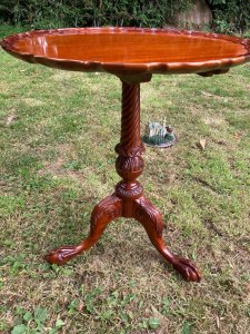 Reproduction Craftsman Made Rich Red Walnut Chippendale Style Wine Table. Circular Top With Ornate Pie Crust Edge, Set In Turned Mount And Tripod Legs With Rich Acantus Leaf Carving And Claw And Ball Feet.