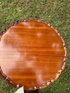 Reproduction Craftsman Made Rich Red Walnut Chippendale Style Wine Table. Circular Top With Ornate Pie Crust Edge, Set In Turned Mount And Tripod Legs With Rich Acantus Leaf Carving And Claw And Ball Feet.