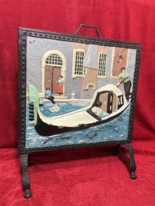 Ornate Venetian Panel Fire Screen With Surrounding Stud Detailing. Rare Brass Fire Screen With Embossed Venetian Gondola Scene Circa 1880. Circa - 1880. Wonderfully Overpainted Bright Scene.