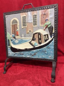 Ornate Venetian Panel Fire Screen With Surrounding Stud Detailing. Rare Brass Fire Screen With Embossed Venetian Gondola Scene Circa 1880. Circa - 1880. Wonderfully Overpainted Bright Scene.