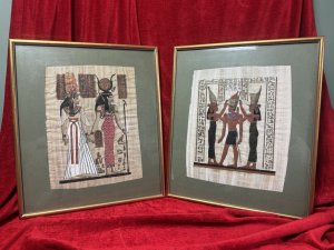 Wonderful Detailed Pair Of Egyptian Papyrus Framed Wall Hangings Circa - 1890 Composition - Papyrus Plant Paper/Ink Artwork 1 - Queen Nefertari Being Led By Goddess Isis. Argwork 2 - Pharoah King Ramessis II Blessing By Flanked Goddess Isis And Hathor. Dimensions In Inches Height 20” x Width 17”