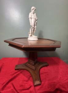 Beautiful Coffee Table In The Art Deco Style. Sits Upon Column Stretcher And X Shaped Pedestal With Bun Feet. Composition - Elm Wood. Height 41.5cm X Width 56cm (Table Top) X Base Width 39cm.
