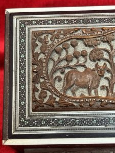 Fine Quality Antique Anglo Indian Carved Jewellrey Casket. Box Interior With Sapphire Velvet. Composition - Carved Sandalwood. Height 6.5cm (Closed ) Width 21cm X Depth 11.5cm.