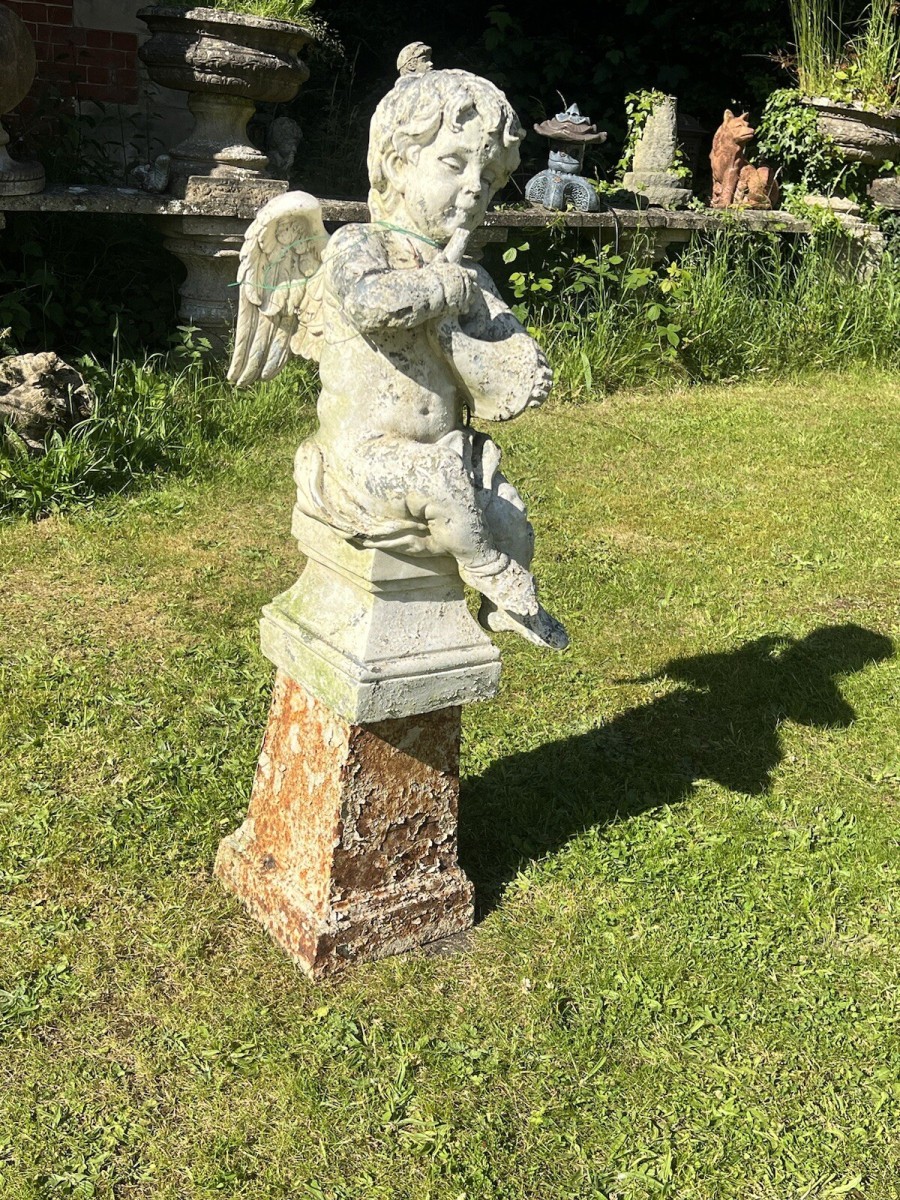 Winged Cherub ‘the Horn Blower’ Garden Showpiece On Iron Plinth