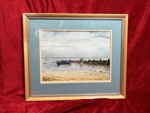 Artist - M Wainwright. Artwork Title - 'Reflections In The Sand'. Composition - Watercolour On Vellum. Fine Art Watercolour Depicting Hoylake Beach Scene Looking Out Towards The Sea. Rowing Boat Moored Next To Water Break Barrier, With Couple Walking Up The Beach Together.