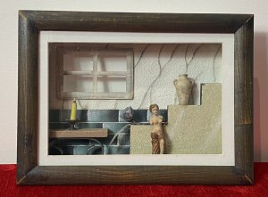 Grecian Bath Interior Scene With Half Tiled Wall And Large Viewing Window. A Tiered Stairway On The Right Side Decorated With Grecian Pot And Blue Rose. Hanging Hooks On Reverse. Composition - Wood/Resin.