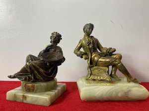 Composition - Bronze Ormolu & Bronze. Set Upon Rectangular Onyx Base.  Showing Signs Of Wear To Face Due To Age. Sits Wearing Gown With 3/4 Lace Sleeves With Oversized Pin Striped Pleated Skirt. Holds Large Bowl In Left Hand With Right Articulating Arm.