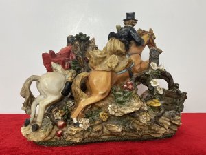 Beautiful Hunting Centrepiece Of Lady Riding Side Saddle On Tan Horse And Gentleman Riding Grey Horse In Red Hunting Jacket. Both Jumping Over Picket Fence With Five Beagle Dogs. Height 10".