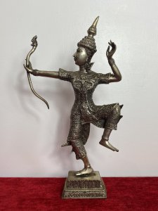 The Female Buddha Holds Snake Motif Bow In Straightened Arm With Left Limbs Bent In Buddhist Pose.Wonderful Facial Details With Delicate Hands. Composition - Bronze Over Painted In Silver Plate. A Rare Collectors Piece.