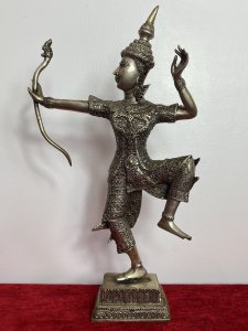 The Female Buddha Holds Snake Motif Bow In Straightened Arm With Left Limbs Bent In Buddhist Pose.Wonderful Facial Details With Delicate Hands. Composition - Bronze Over Painted In Silver Plate. A Rare Collectors Piece.
