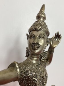 The Female Buddha Holds Snake Motif Bow In Straightened Arm With Left Limbs Bent In Buddhist Pose.Wonderful Facial Details With Delicate Hands. Composition - Bronze Over Painted In Silver Plate. A Rare Collectors Piece.