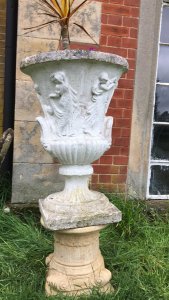 Large Roman Style Campagna Shaped Urn With Scalloped Edges. With Small Dwarf Palm Tree. Composition- Reconstituted Stone. Stunning Piece For Garden Centrepiece Display Of Flowers. Showing Signs Of Weathering Due To Age & Usage.