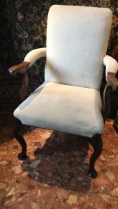 Fine Pair Of Mahogany George II Style Brass Studded High Back Elbow Chairs. Beautiful Solid Mahogany Craftsman Made Elbow Frames In George II Style With High Backs, Sweeping Arm Rests, Wide Seats And Pad Feet. Padded Upholstery In Luxurious Cream Chenille Fabric With Brass Studded Parameters. Strong, Exceptional Comfort Elegant Design Reproduction Pair In Stunning Condition. Perfect For Lounge, Study, Hallway. Dimensions In Inches Back Height 43” Seat Width 25” Seat Height 19” Seat Depth 24” Weight Approx 50KG Pair