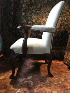 Fine Pair Of Mahogany George II Style Brass Studded High Back Elbow Chairs. Beautiful Solid Mahogany Craftsman Made Elbow Frames In George II Style With High Backs, Sweeping Arm Rests, Wide Seats And Pad Feet. Padded Upholstery In Luxurious Cream Chenille Fabric With Brass Studded Parameters. Strong, Exceptional Comfort Elegant Design Reproduction Pair In Stunning Condition. Perfect For Lounge, Study, Hallway. Dimensions In Inches Back Height 43” Seat Width 25” Seat Height 19” Seat Depth 24” Weight Approx 50KG Pair