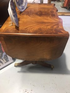 Stunning Red Walnut Cross Banded Serpentine Top With Two Drop Leaves. This Table Would Look Stunning In A Hallway, Dinning Room Or Even Bedroom. A Truly Stunning Antique Piece. Due To The Age Of This Piece There Are Signs Of Wear.