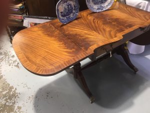 Stunning Red Walnut Cross Banded Serpentine Top With Two Drop Leaves. This Table Would Look Stunning In A Hallway, Dinning Room Or Even Bedroom. A Truly Stunning Antique Piece. Due To The Age Of This Piece There Are Signs Of Wear.