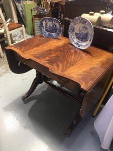 Stunning Red Walnut Cross Banded Serpentine Top With Two Drop Leaves. This Table Would Look Stunning In A Hallway, Dinning Room Or Even Bedroom. A Truly Stunning Antique Piece. Due To The Age Of This Piece There Are Signs Of Wear.