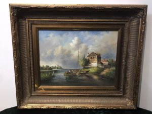 Original Oil Painting Coastal Boating Scene By Artist J Elliot Sail Boat And Inflatable Boat With 5 Figures Detailed House In The Foreground And Windmill In The Landscape Background Stunning Perspective With Great Detail Beautifully Painted Thought To Be Somewhere In Norfolk Oil On Board Set In Gilt Frame Signed By Artist J Elliot Dimensions In Inches Height 20” Width 24”
