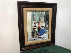Original Contemporary Spanish Wedding Party Oil On Board Painting Signed By Artist AIXADO Spanish Bride In The Church Doorway With Three Guests Outside The Church In Traditional Clothing Bright Hues And Lovely Detail Mahogany Hardwood Frame With Velvet Boarder Signed Front And Back By The Artist Dimensions In Inches Height 21” Width 17.5” Frame Depth 1.5”