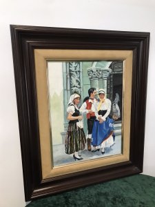 Original Contemporary Spanish Wedding Party Oil On Board Painting Signed By Artist AIXADO Spanish Bride In The Church Doorway With Three Guests Outside The Church In Traditional Clothing Bright Hues And Lovely Detail Mahogany Hardwood Frame With Velvet Boarder Signed Front And Back By The Artist Dimensions In Inches Height 21” Width 17.5” Frame Depth 1.5”